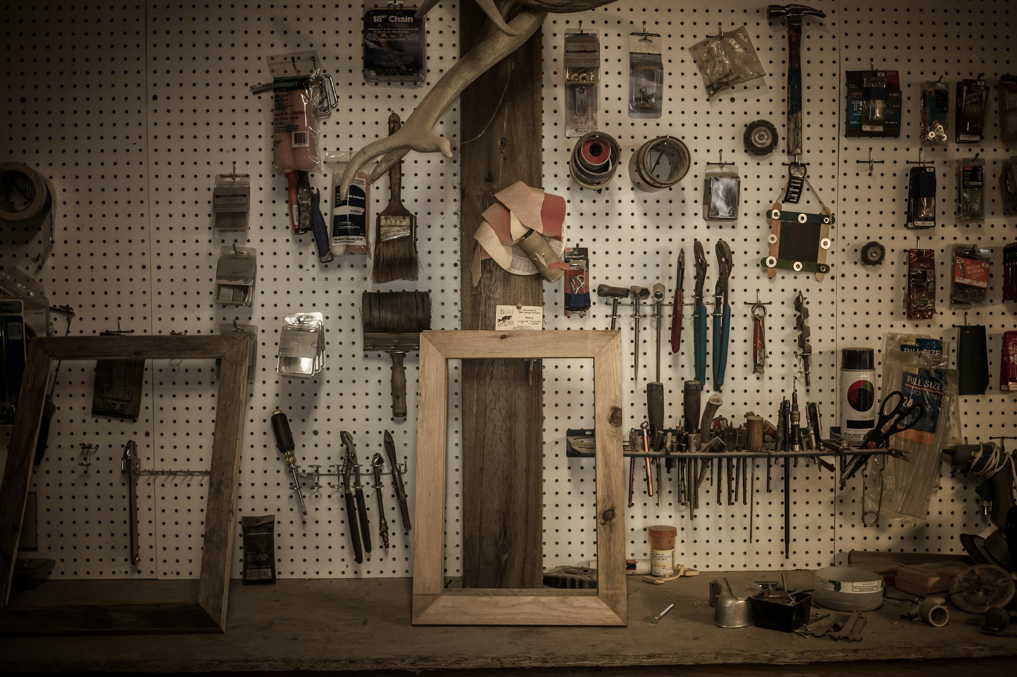 Tools hanging in artist's workshop